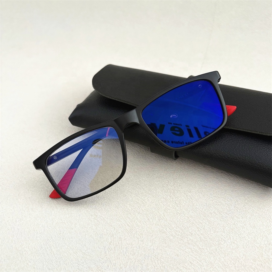 Large square oversized blue light blocking glasses with wide temples and amber-tinted lenses