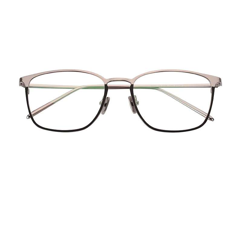 Minimal beta-titanium blue light blocking glasses with a half-rim front and amber lenses