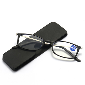 Slim rectangular reading glasses with amber-tinted magnifying lenses and thin temples