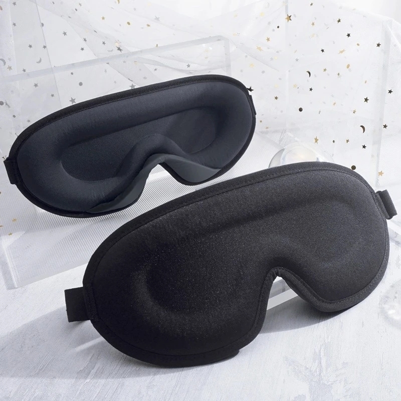 Contoured mulberry silk sleep mask with moulded eye cups and an adjustable strap